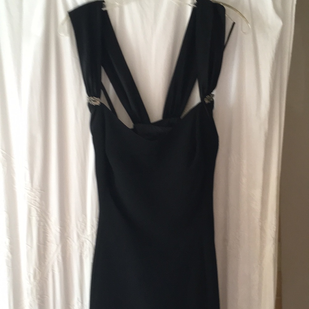 Timeless Black Evening dress with rhinestone clasps.